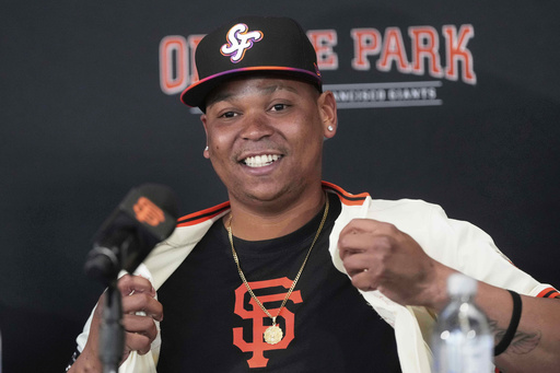San Francisco Giants' Rafael Devers speaks at a news conference before a baseball game against the Cleveland Guardians in San Francisco, Tuesday, June 17, 2025. (AP Photo/Jeff Chiu)