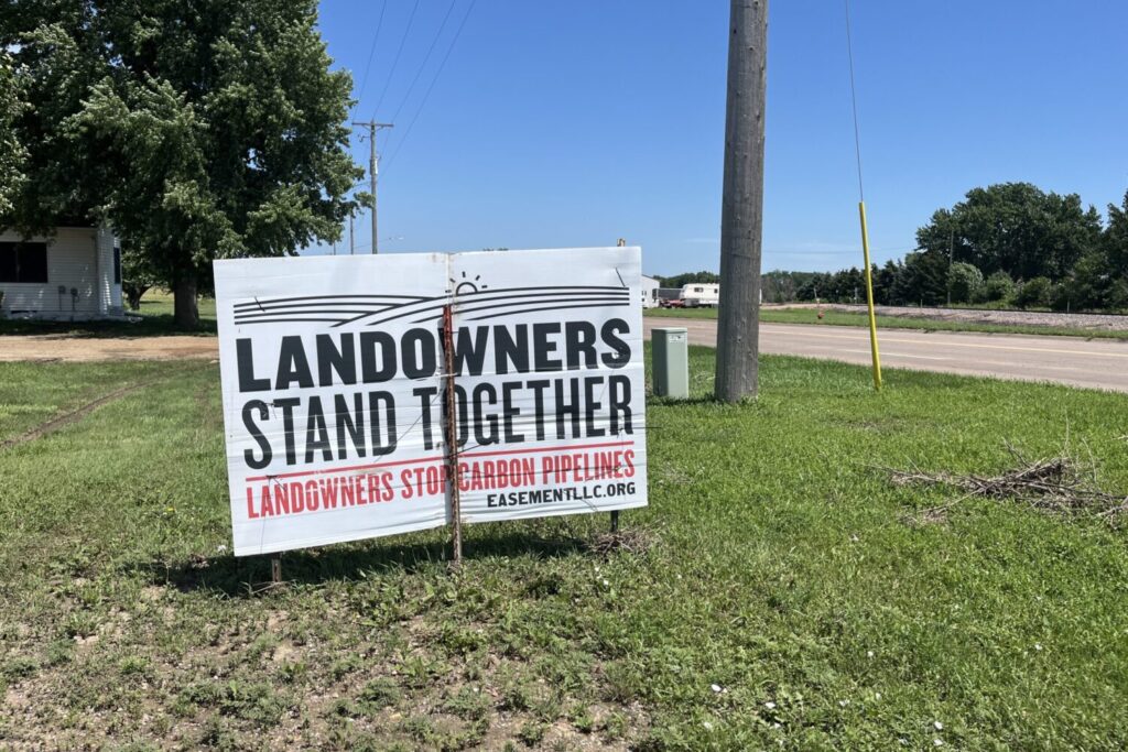 An anti-carbon pipeline sign is set up along the road near Canton. (Makenzie Huber/South Dakota Searchlight)