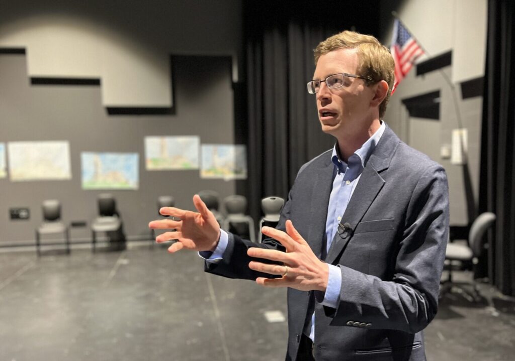 U.S. Rep. Dusty Johnson, R-South Dakota, speaks with students on May 19, 2023, in Sioux Falls. (Joshua Haiar/SD Searchlight)