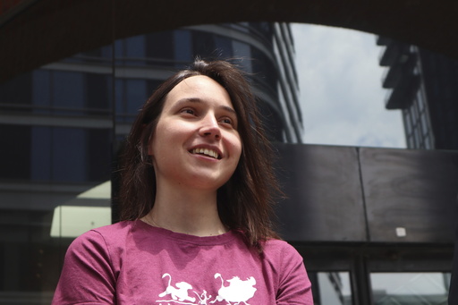 Harvard University researcher Kseniia Petrova, 30, smiles after being released on bail from federal custody at the John Joseph Moakley United States Courthouse on Thursday, June 12, 2025, in Boston. (AP Photo/Leah Willingham)