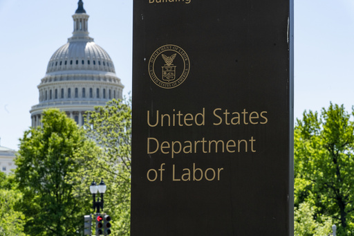 FILE - The entrance to the Labor Department is seen near the Capitol in Washington, May 7, 2020. (AP Photo/J. Scott Applewhite, File)