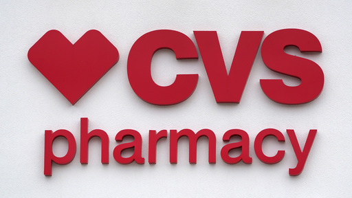 FILE - The CVS Pharmacy logo is displayed on a store on Aug. 3, 2021, in Woburn, Mass. (AP Photo/Charles Krupa, File)