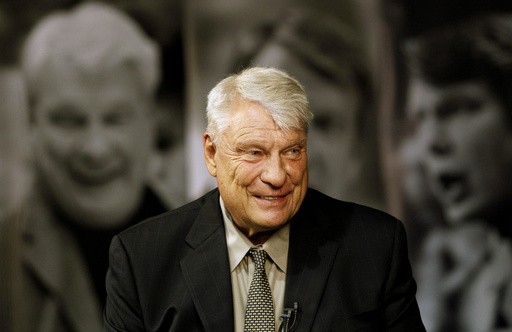 FILE - Former Golden State Warriors head coach Don Nelson smiles while being interviewed at the Warriors NBA training facility in Oakland, Calif., Tuesday, Aug. 28, 2012. (AP Photo/Jeff Chiu, File)