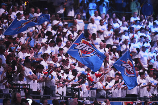 Fans cheer before Game 1 of the NBA Finals basketball series between the Indiana Pacers and the Oklahoma City Thunder Thursday, June 5, 2025, in Oklahoma City. (AP Photo/Nate Billings)