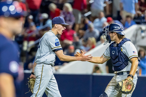 FILE - Murray State pitcher Graham Kelham (41) celebrates with catcher Will Vierling (17) after a 9-6 win over Mississippi at an NCAA regional college baseball game, Friday, May 30, 2025, Oxford, Miss. (AP Photo/Vasha Hunt, File)
