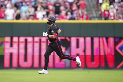 Cincinnati Reds' Spencer Steer rounds the bases after hitting a two-run home run during the fifth inning of a baseball game against the San Diego Padres, Friday, June 27, 2025, in Cincinnati. (AP Photo/Jeff Dean)