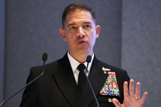 FILE - U.S. Navy Vice Adm. Brad Cooper, speaks at an event at the International Defense Exhibition and Conference in Abu Dhabi, United Arab Emirates, Feb. 21, 2023. (AP Photo/Jon Gambrell, File)