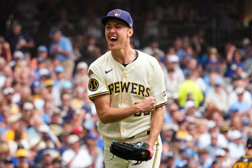 Milwaukee Brewers pitcher Jacob Misiorowski (32) reacts to striking out Pittsburgh Pirates' Oneil Cruz for the third out in the fourth inning of a baseball game, Wednesday, June 25, 2025, in Milwaukee. (AP Photo/Kayla Wolf)