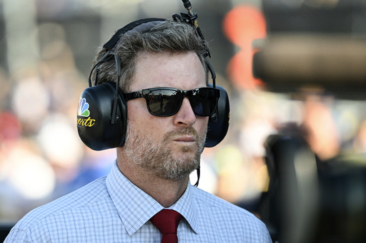 FILE - Hall of Fame driver Dale Earnhardt Jr. looks on prior to a NASCAR Cup Series auto race at Darlington Raceway, Sept. 3, 2023, in Darlington, S.C. (AP Photo/Matt Kelley, File)