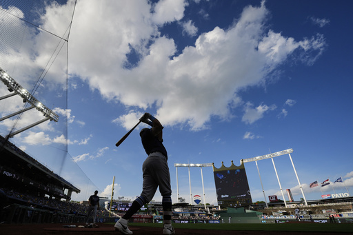 Tampa Bay Rays' Jonathan Aranda warms up on deck before the second inning of a baseball game against the Kansas City Royals, Tuesday, June 24, 2025, in Kansas City, Mo. (AP Photo/Charlie Riedel)