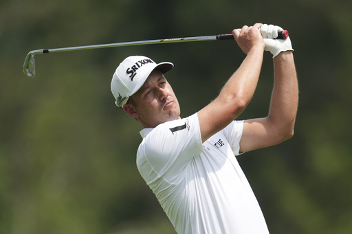 Andrew Putnam hits from the ninth tee during the first round of the Rocket Classic golf tournament at the Detroit Golf Club, Thursday, June 26, 2025, in Detroit. (AP Photo/Paul Sancya)