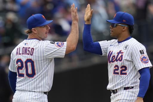 New York Mets' Pete Alonso, left, and Juan Soto, right, celebrate after a baseball game against the Colorado Rockies, Sunday, June 1, 2025, in New York. (AP Photo/Seth Wenig)