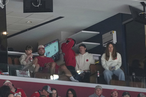 Singer Taylor Swift and her boyfriend Travis Kelce watch Game 4 of the NHL hockey Stanley Cup Final between the Florida Panthers and the Edmonton Oilers,Thursday, June 12, 2025, in Sunrise, Fla. (AP Photo/Lynne Sladky)