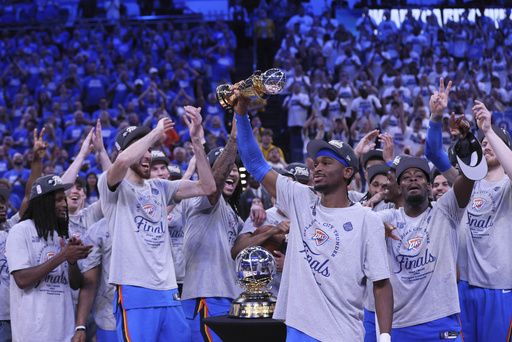 Oklahoma City Thunder guard Shai Gilgeous-Alexander (2), front, celebrates with teammates after Game 5 of the Western Conference finals of the NBA basketball playoffs against the Minnesota Timberwolves, Wednesday, May 28, 2025, in Oklahoma City. (AP Photo/Nate Billings)