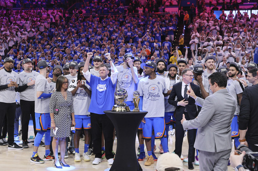 Oklahoma City Thunder players and coaches celebrate after Game 5 of the Western Conference finals of the NBA basketball playoffs against the Minnesota Timberwolves, Wednesday, May 28, 2025, in Oklahoma City. (AP Photo/Nate Billings)