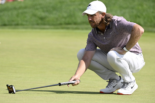 Tommy Fleetwood, of England, lines up his put on the ninth green during the third round of the Travelers Championship golf tournament at TPC River Highlands, Saturday, June 21, 2025, in Cromwell, Conn. (AP Photo/Jessica Hill)