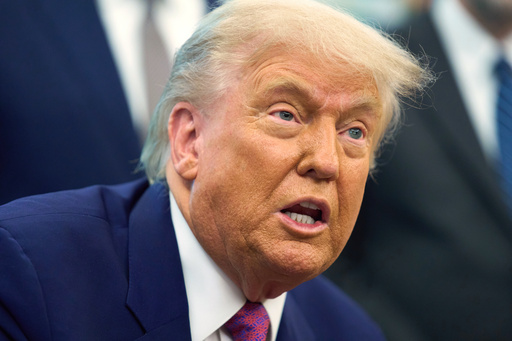 President Donald Trump speaks with reporters in the Oval Office of the the White House, Tuesday, June 10, 2025, in Washington. (AP Photo/Evan Vucci)