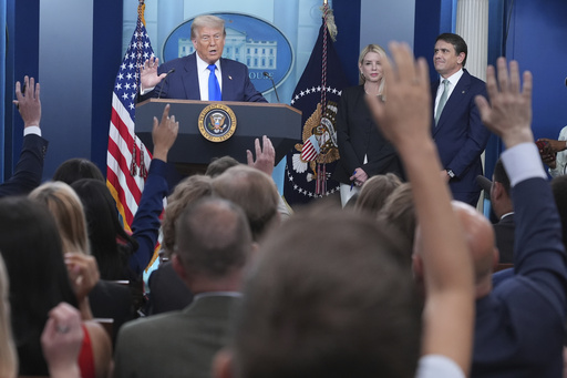 President Donald Trump, from left, speaks to the media as Attorney General Pam Bondi and Deputy Attorney General Todd Blance listen, Friday, June 27, 2025, in the briefing room of the White House in Washington. (AP Photo/Jacquelyn Martin)
