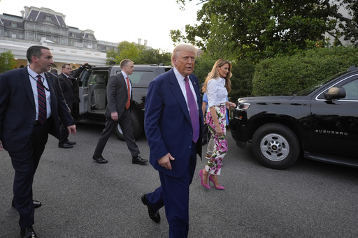 President Donald Trump and first lady Melania Trump walk after greeting guests during the congressional picnic on the South Lawn of the White House, Thursday, June 12, 2025, in Washington. (AP Photo/Alex Brandon)