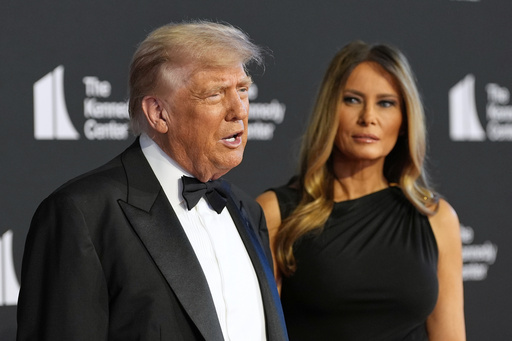 President Donald Trump and first lady Melania Trump arrive to view opening night of "Les Miserables," at the Kennedy Center, Wednesday, June 11, 2025, in Washington. (AP Photo/Alex Brandon)