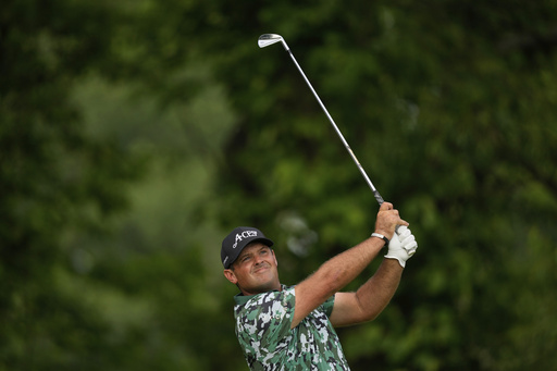 Patrick Reed tees off on the 13th hole during the first round of the U.S. Open golf tournament at Oakmont Country Club Thursday, June 12, 2025, in Oakmont, Pa. (AP Photo/Carolyn Kaster)