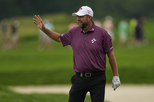 Marc Leishman, of Australia, celebrates after making birdie on the eighth hole during the third round of the U.S. Open golf tournament at Oakmont Country Club Saturday, June 14, 2025, in Oakmont, Pa. (AP Photo/Carolyn Kaster)