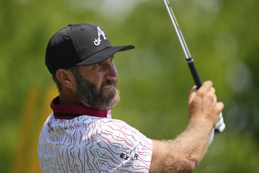 Dustin Johnson tees off on the 13th hole during a practice round ahead of the U.S. Open golf tournament at Oakmont Country Club Tuesday, June 10, 2025, in Oakmont, Pa. (AP Photo/Charlie Riedel)