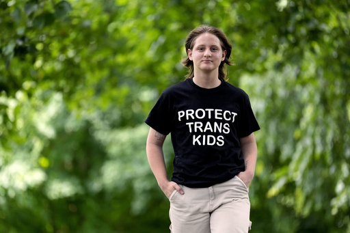 Eli Givens walks in a park Wednesday, June 18, 2025, in Franklin, Tenn., after the Supreme Court upheld Tennessee's ban on gender-affirming care for transgender minors. (AP Photo/Mark Humphrey)