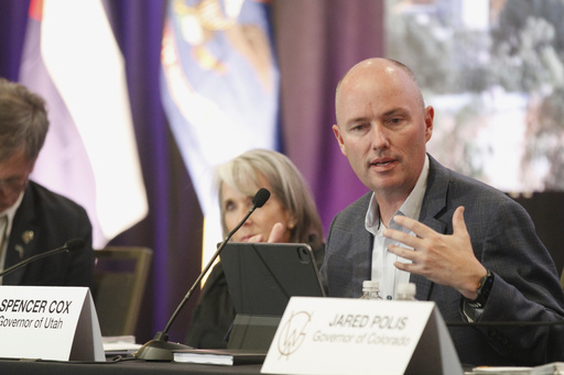 Utah Gov. Spencer Cox, speaks as he started serving as chairman of the Western Governors' Association in Santa Fe, N.M., Tuesday, June 24, 2025, at the group's annual meeting, taking over for New Mexico Gov. Michelle Lujan Grisham. (AP Photo/Morgan Lee)