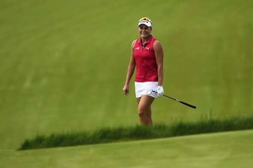 Lexi Thompson smiles on the 11th hole during the first round of the U.S. Women's Open golf tournament at Erin Hills Thursday, May 29, 2025, in Erin, Wis. (AP Photo/Matt York)