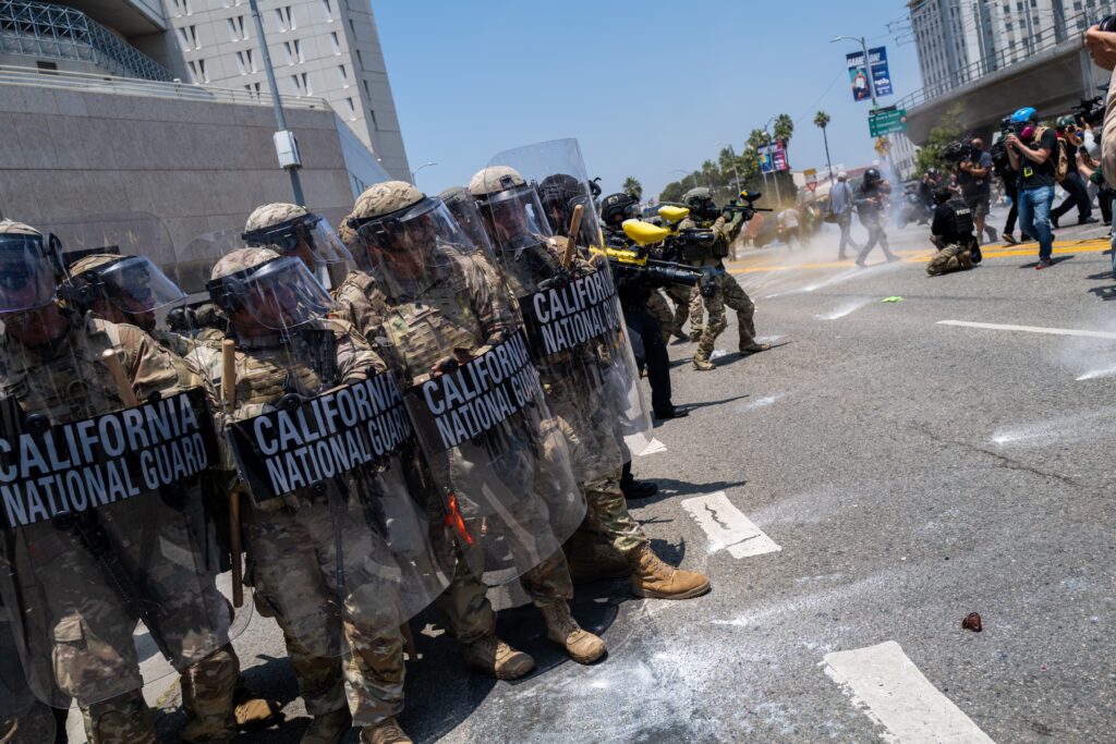 Demonstrators protest outside a downtown jail in Los Angeles following two days of clashes with police during a series of immigration raids on June 8, 2025, in Los Angeles, California. (Photo by Spencer Platt/Getty Images)