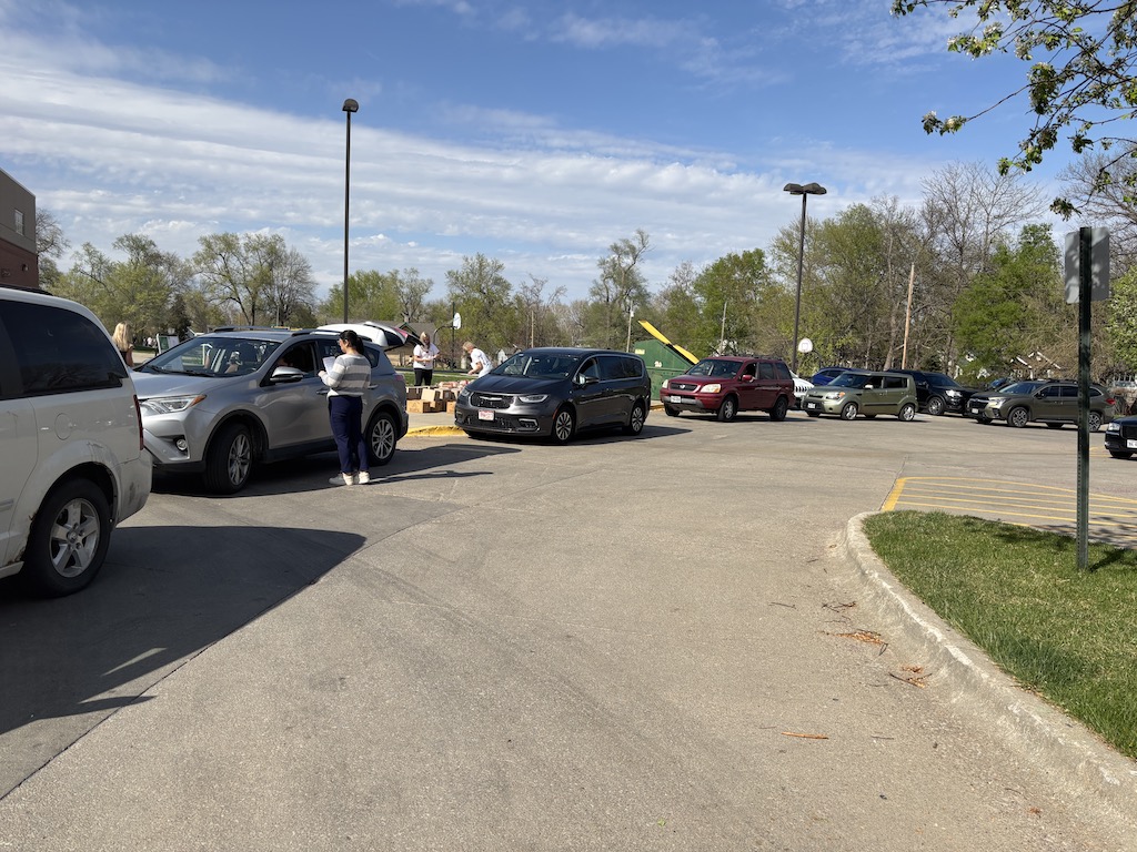 Volunteers distribute food at Food Bank for the Heartland’s mobile pantry at an Omaha, Neb., elementary school in April. (Photo courtesy of Food Bank for the Heartland)