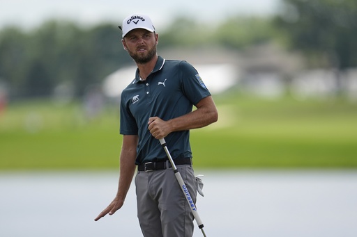 Adam Svensson reacts to his putt on the 18th hole during the first round of the 3M Open golf tournament at the Tournament Players Club Thursday, July 24, 2025, in Blaine, Minn. (AP Photo/Abbie Parr)