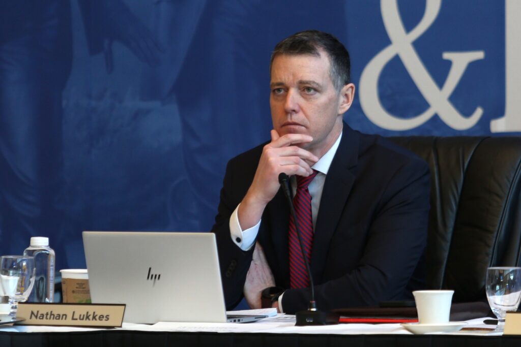 South Dakota Board of Regents Executive Director Nathan Lukkes participates in a meeting Dec. 14, 2023, in Brookings. (Makenzie Huber/South Dakota Searchlight)