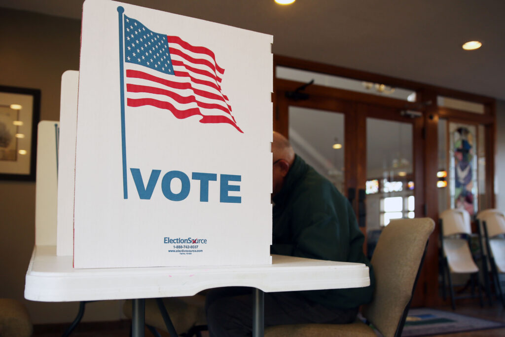 A Sioux Falls resident votes in the city and school board election at Southern Hills United Methodist Church on April 9, 2024. (Makenzie Huber/South Dakota Searchlight)