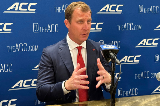 SMU coach Rhett Lashlee speaks at the Atlantic Coast Conference NCAA college football media days, Tuesday, July 22, 2025, in Charlotte, N.C. (AP Photo/Steve Reed)
