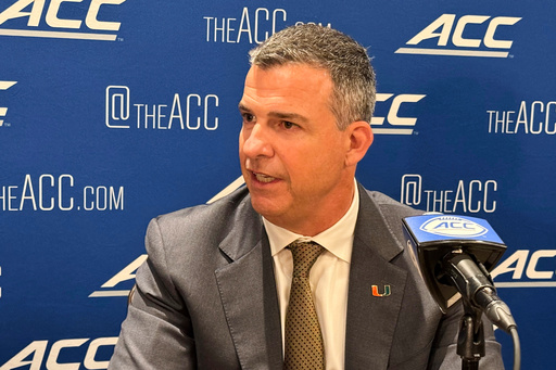 Miami coach Mario Cristobal speaks at the Atlantic Coast Conference NCAA college football media days, Tuesday, July 22, 2025, in Charlotte, N.C. (AP Photo/Steve Reed)