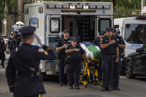 The casket of NYPD Officer Didarul Islam arrives at Parkchester Jame Masjid after Monday's deadly shooting, Tuesday, July 29, 2025, in New York. (AP Photo/Yuki Iwamura)