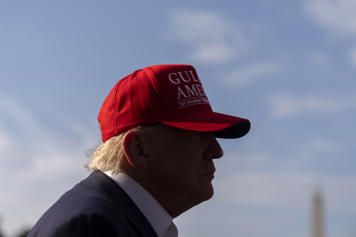 President Donald Trump speaks to the media before walking across the South Lawn of the White House to board Marine One en route to Joint Base Andrews, Md., and on to Florida, Tuesday, July 1, 2025, in Washington. (AP Photo/Mark Schiefelbein)