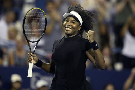 Venus Williams celebrates her win over Peyton Stearns during a match at the Citi Open tennis tournament Tuesday, July 22, 2025, in Washington. (AP Photo/Nick Wass)