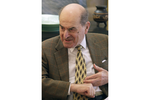 FILE - Dr. Henry Heimlich describes the maneuver he developed to help clear obstructions from the windpipes of choking victims, during an interview in his home in Cincinnati on Wednesday, Feb. 5, 2014. (AP Photo/Al Behrman, File)