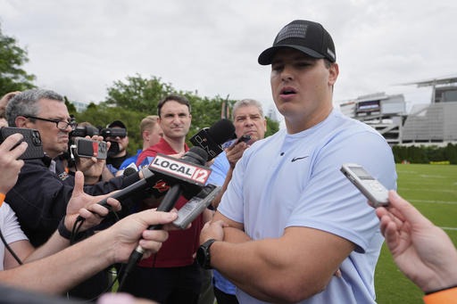 FILE - Cincinnati Bengals defensive end Trey Hendrickson speaks to media during NFL football practice on May 13, 2025, in Cincinnati. (AP Photo/Carolyn Kaster, file)