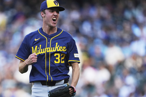 Milwaukee Brewers starting pitcher Jacob Misiorowski reacts after striking out Seattle Mariners' Dominic Canzone to retire the side during the second inning of a baseball game Tuesday, July 22, 2025, in Seattle. (AP Photo/Lindsey Wasson)