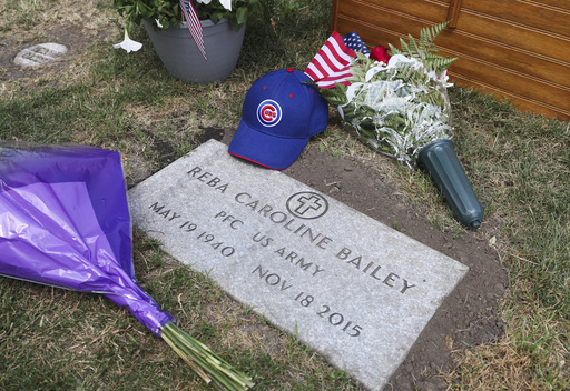 The grave marker of 75-year-old Pfc. Reba C. Bailey, a former missing person cold case named Seven Doe, is seen during a military funeral at Mount Olivet Catholic Cemetery in Chicago, Tuesday, July 1, 2025. (AP Photo/Talia Sprague)