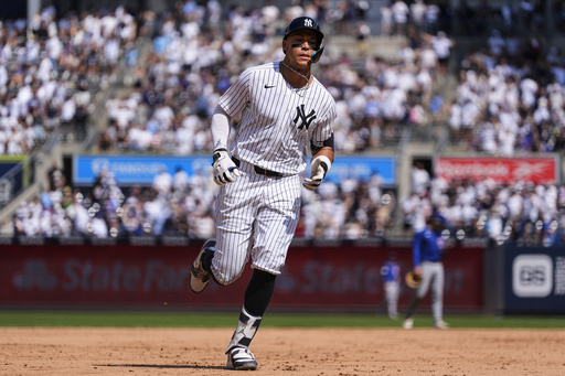 New York Yankees' Aaron Judge (99) runs after hitting a two run home run during the inning of a baseball game against the , Saturday, July 12, 2025, in New York. (AP Photo/Yuki Iwamura)
