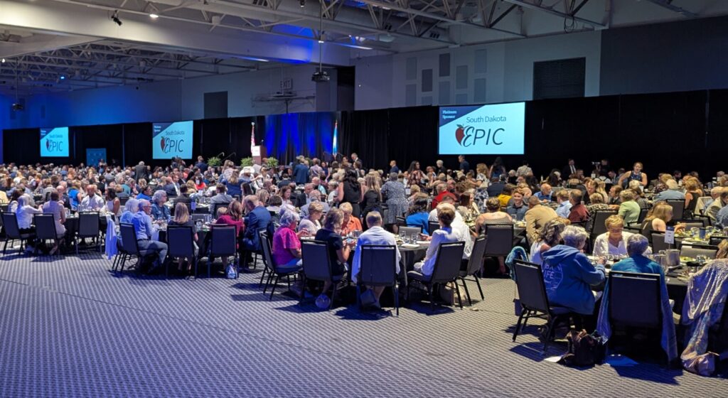A crowd gathers to hear Minnesota Gov. Tim Walz at the 2025 McGovern Day dinner on July 13, 2025, in Sioux Falls. (John Hult/South Dakota Searchlight)
