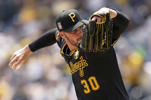 Pittsburgh Pirates pitcher Paul Skenes delivers during the first inning of a baseball game against the Arizona Diamondbacks, Sunday, July 27, 2025, in Pittsburgh. (AP Photo/Matt Freed)