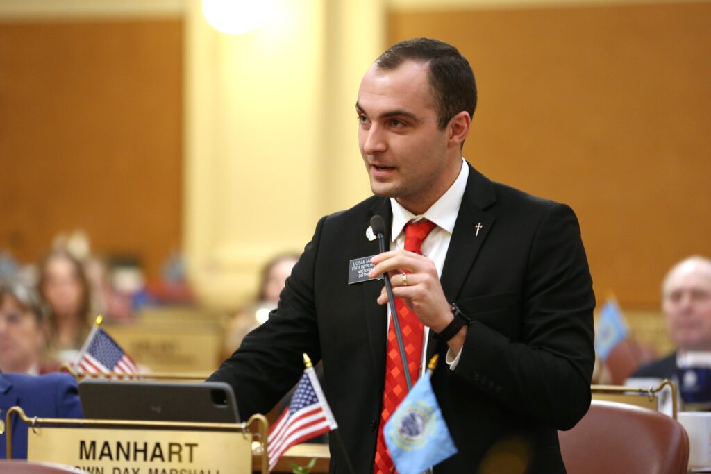 State Rep. Logan Manhart, R-Aberdeen, speaks on the South Dakota House floor on Jan. 22, 2025. (Makenzie Huber/South Dakota Searchlight)