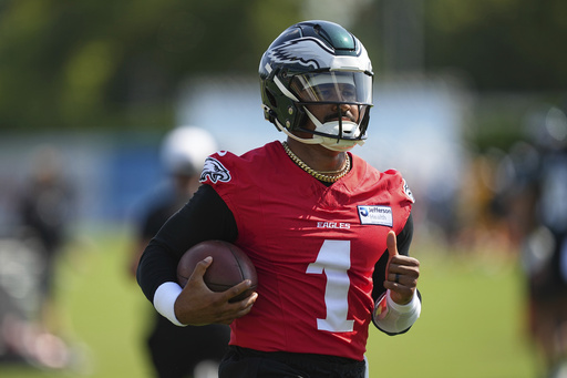 Philadelphia Eagles quarterback Jalen Hurts runs a drill during an NFL football training camp, Wednesday, July 23, 2025, in Philadelphia. (AP Photo/Matt Rourke)