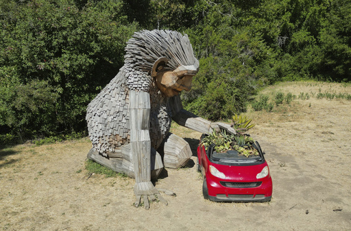 A giant troll sculpture created by the Danish recycle artist Thomas Dambo and his team that's part of an installation of six sculptures called "Trolls Save the Humans" is seen on display at the historic estate Filoli, Saturday, July 5, 2025, in Woodside, Calif. (AP Photo/Terry Chea)